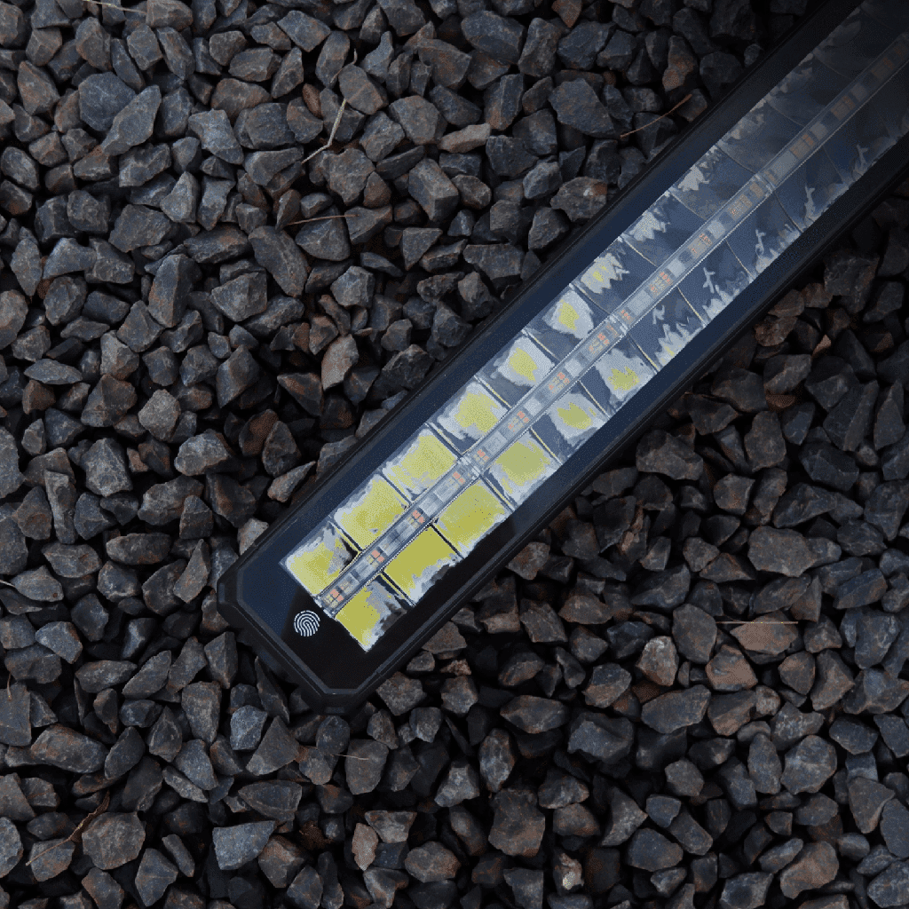 MURDA MX30 single-row LED light bar shown on gravel — clear lens and internal LED detail